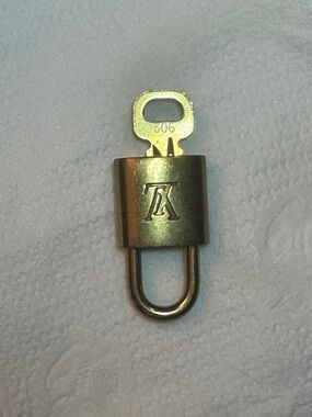Louis Vuitton Padlock and key set for Alma, Speedy, keepall
